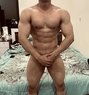 Muscular Guy in Qatar - Male escort in Doha Photo 2 of 7