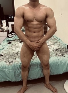 Muscular Guy in Qatar - Male escort in Doha Photo 2 of 7