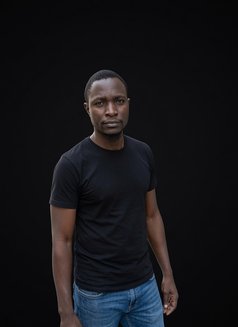 Adams - Male escort in Nairobi Photo 2 of 3