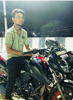 African boy - Male adult performer in New Delhi Photo 2 of 4