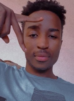 African Guy - Male escort in Kuwait Photo 2 of 3