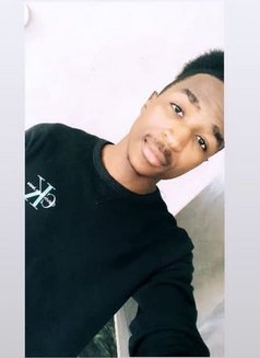 African Guy - Male escort in Kuwait Photo 3 of 3