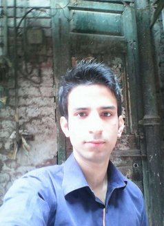 Ali - Male escort in Lahore Photo 2 of 2