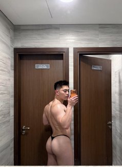 Asian Muscle Hunk - Male escort in Dubai Photo 1 of 7