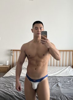 Asian Muscle Hunk - Male escort in Dubai Photo 2 of 7