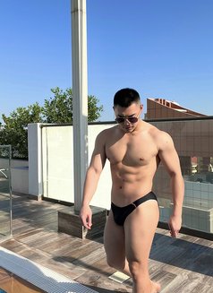 Asian Muscle Hunk - Male escort in Dubai Photo 3 of 7