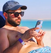 Bash - Male companion in Abu Dhabi