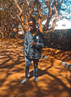 Big D - Male escort in Nairobi Photo 3 of 4