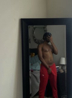 Black - Male escort in Al Manama Photo 1 of 2