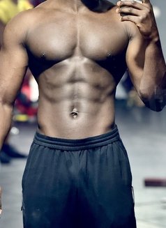 Black Muscle - Male escort in Doha Photo 1 of 2