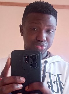 Bonventure - Male escort in Nairobi Photo 3 of 8