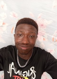 Bonventure - Male escort in Nairobi Photo 8 of 8