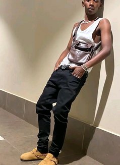 Calvin - Male escort in Nairobi Photo 1 of 3