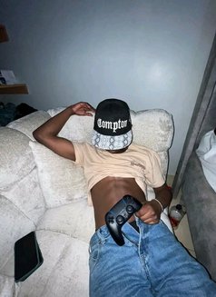 Calvin - Male escort in Nairobi Photo 2 of 3