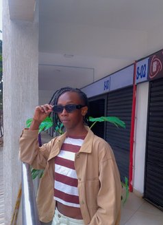 Calvin - Male escort in Nairobi Photo 5 of 7