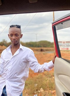 Calvin - Male escort in Nairobi Photo 6 of 7