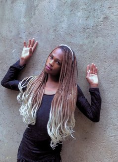 Cate - Transsexual escort in Nairobi Photo 7 of 7