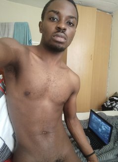 Chew - Male escort in Nairobi Photo 1 of 4