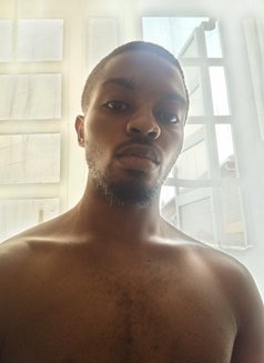 Chew - Male escort in Nairobi Photo 9 of 11
