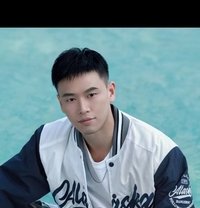 China Boy Tom - Male escort in Dubai Photo 1 of 4