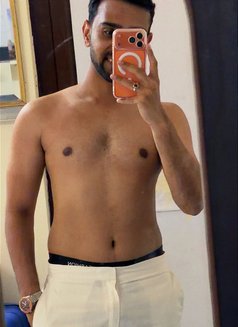 Chris - Male escort in Al Manama Photo 2 of 3