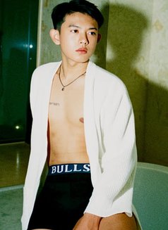 Christ Young Hyper Boy - Male escort in Jakarta Photo 2 of 11