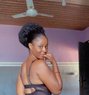 Clara - escort in Accra Photo 1 of 2