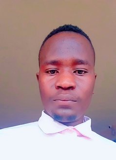 Cosmas - Male escort in Nairobi Photo 1 of 3