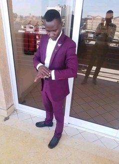 Cosmas - Male escort in Nairobi Photo 2 of 3