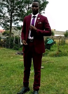 Cosmas - Male escort in Nairobi Photo 3 of 3
