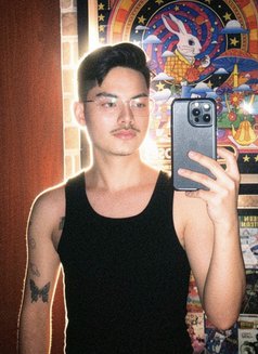 Cozy Asian Couple - Male escort in Manila Photo 2 of 5