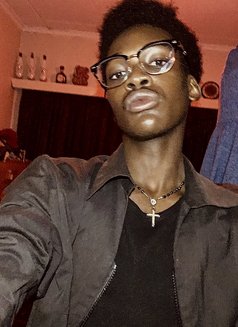 Dark Chocolate - Male escort in Nairobi Photo 1 of 6