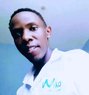 Davie - Male escort in Nairobi Photo 1 of 4