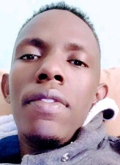 Davie - Male escort in Nairobi Photo 2 of 3