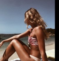 Define - escort in Singapore