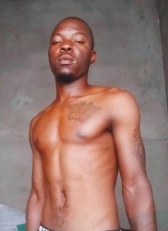 Tanaka - Male escort in Harare Photo 1 of 4