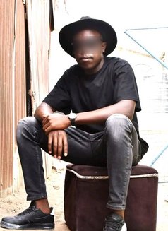 Didi - Male escort in Nairobi Photo 2 of 3