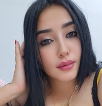 Dinar - escort in Muscat