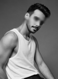 Discover True Luxury With Faisal - Male escort in London Photo 1 of 5