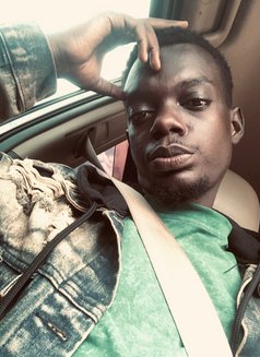 Eddie - Male escort in Kampala Photo 1 of 3