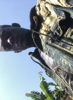 Eddie - Male escort in Kampala Photo 2 of 3