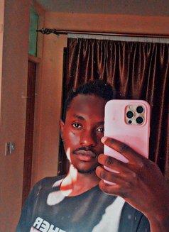 Eddy - Male escort in Nairobi Photo 4 of 4