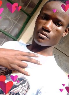Edwin - Male escort in Nairobi Photo 1 of 3