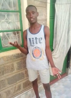 Edwin - Male escort in Nairobi Photo 2 of 3