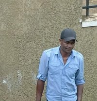 Evans Kenyan - Male adult performer in Kampala
