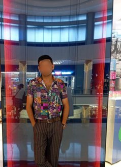 Faizal - Male escort in Muscat Photo 2 of 4