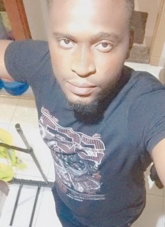 Godwinneypussyeater - Male escort in Kampala Photo 1 of 2