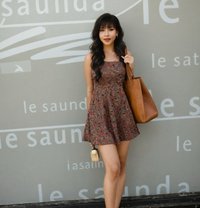 Mature & petite companion - escort in Hong Kong Photo 1 of 8