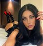 Issi - escort in London Photo 1 of 2