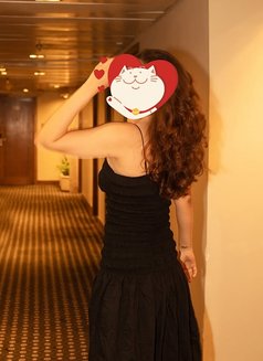 Jenny - escort in Kochi Photo 2 of 3